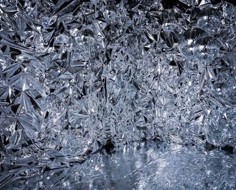 Twinkle Twinkle set at Hadaki Studios featuring reflective mylar walls and shimmering disco balls, creating a futuristic and immersive photography space in Toronto.